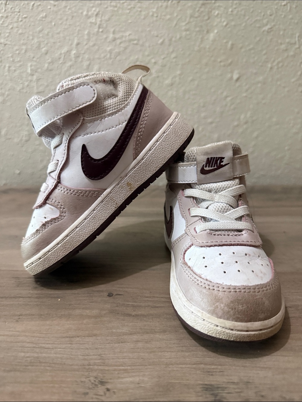Nike Kids Mid-Top Sneakers in White and Light Pink with Dark Brown Swoosh